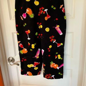 Cropped black cotton blend pants with fun cocktail pattern